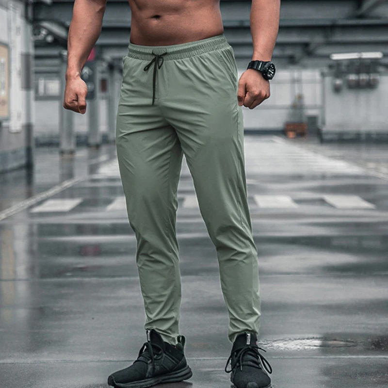 Running Pant Jogger - Celana Olahraga Pria dengan Saku Celana